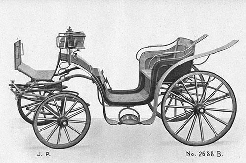 Ponyvogn med buk i udateret katalog fra J. H. Jensens vognfabrik i Højer. Bemærk, at det lille barnesæde kan klappes ned.